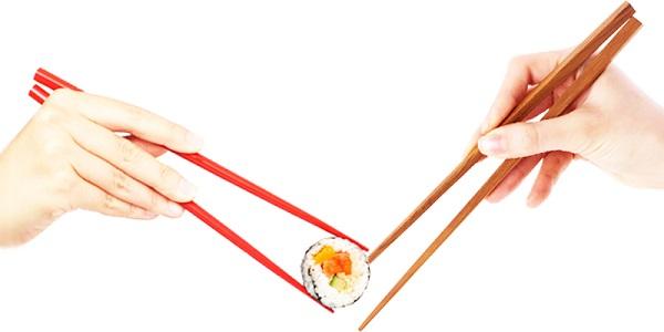 passing food with chopsticks