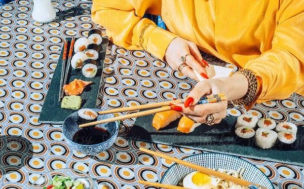 Eating Sushi with Chopsticks