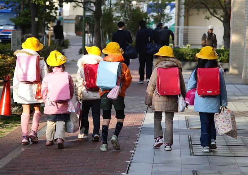 Japanese school children walking to school