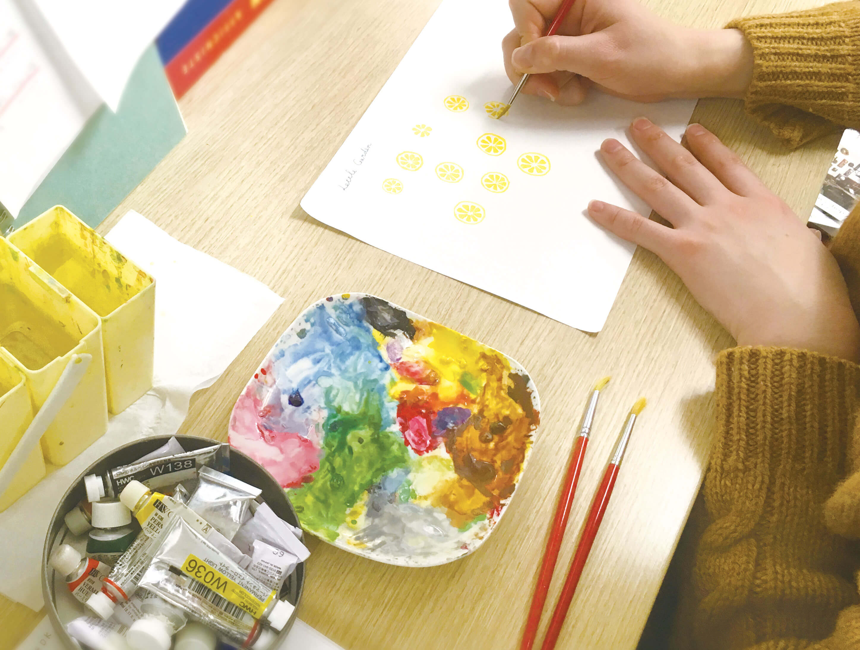 An artist works on a new Ryu-Ryu stationery design